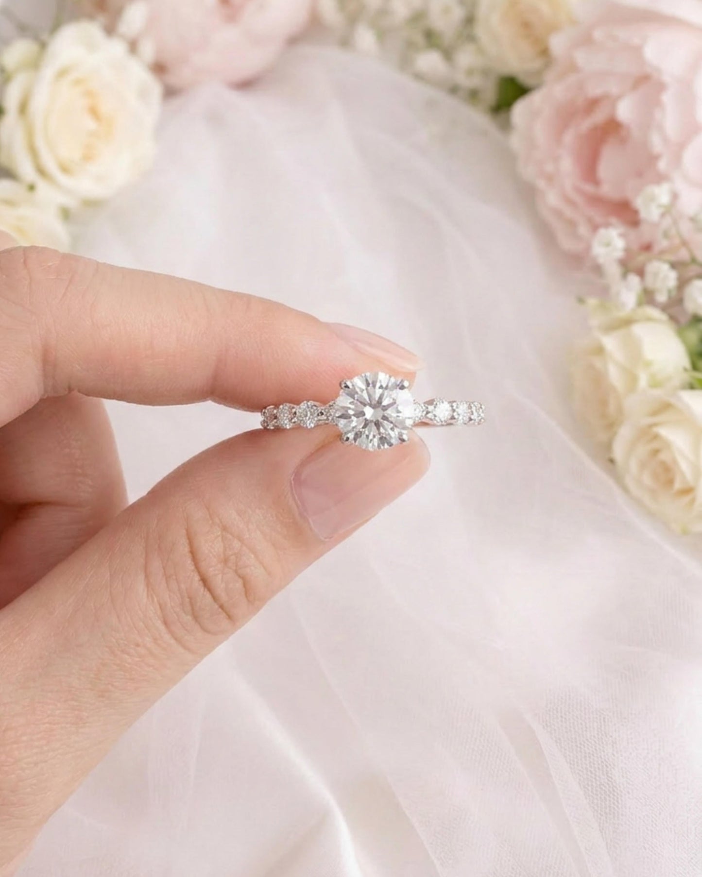 Cascade Round Engagement Ring with Side Round Stones