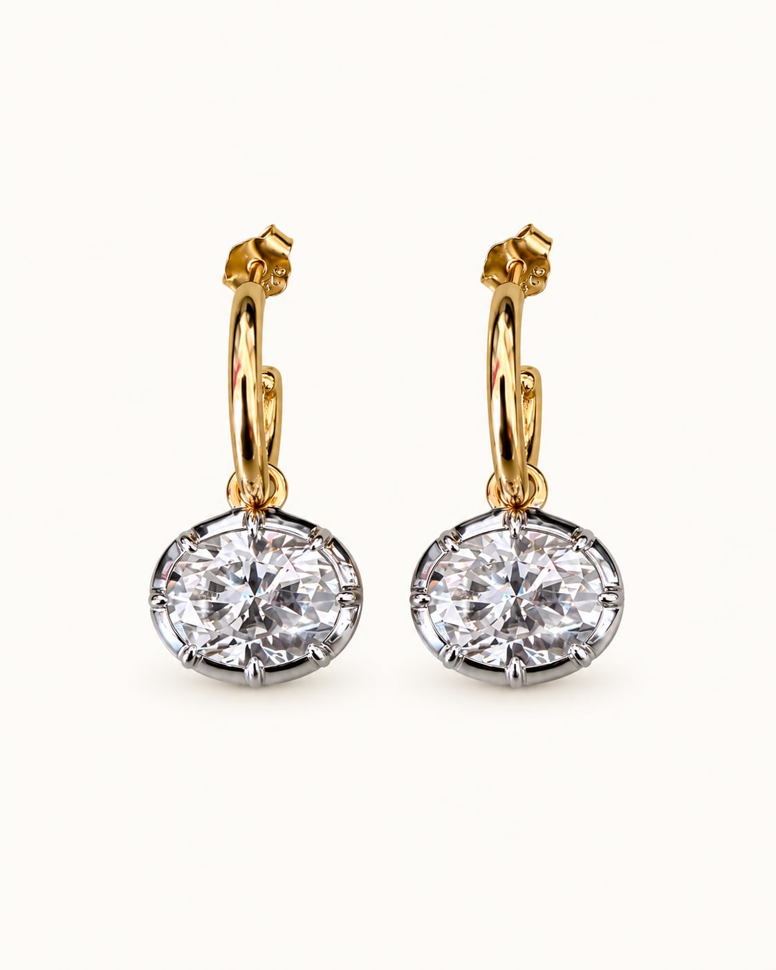 Forte oval moissanite bezel earrings with gold hoops and silver-tone pendants, front view of the pair